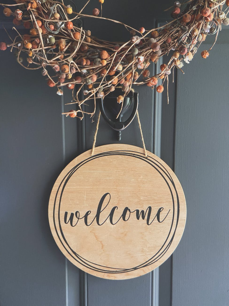 close up photo of a wooden welcome signage